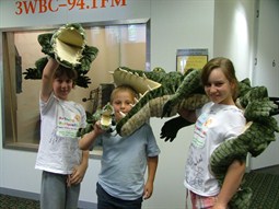 Harry J Miani with croc puppets